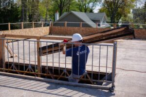 360 working carrying smoke filled logs